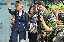 Hillary Clinton visits public toilets at Mercy Corps site in Indonesia